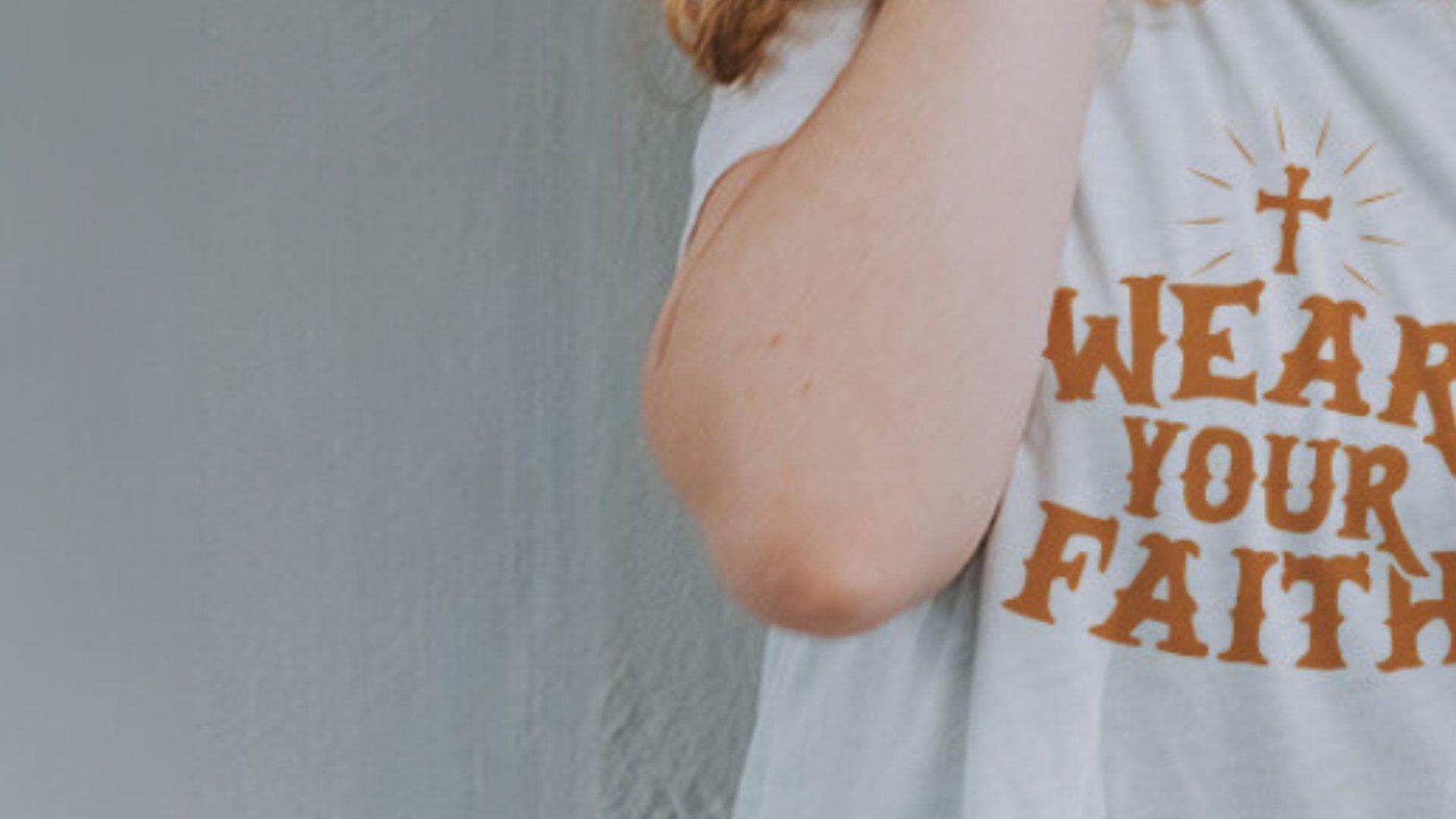 image of a girl in a wear your faith custom tshirt made using spreadshop